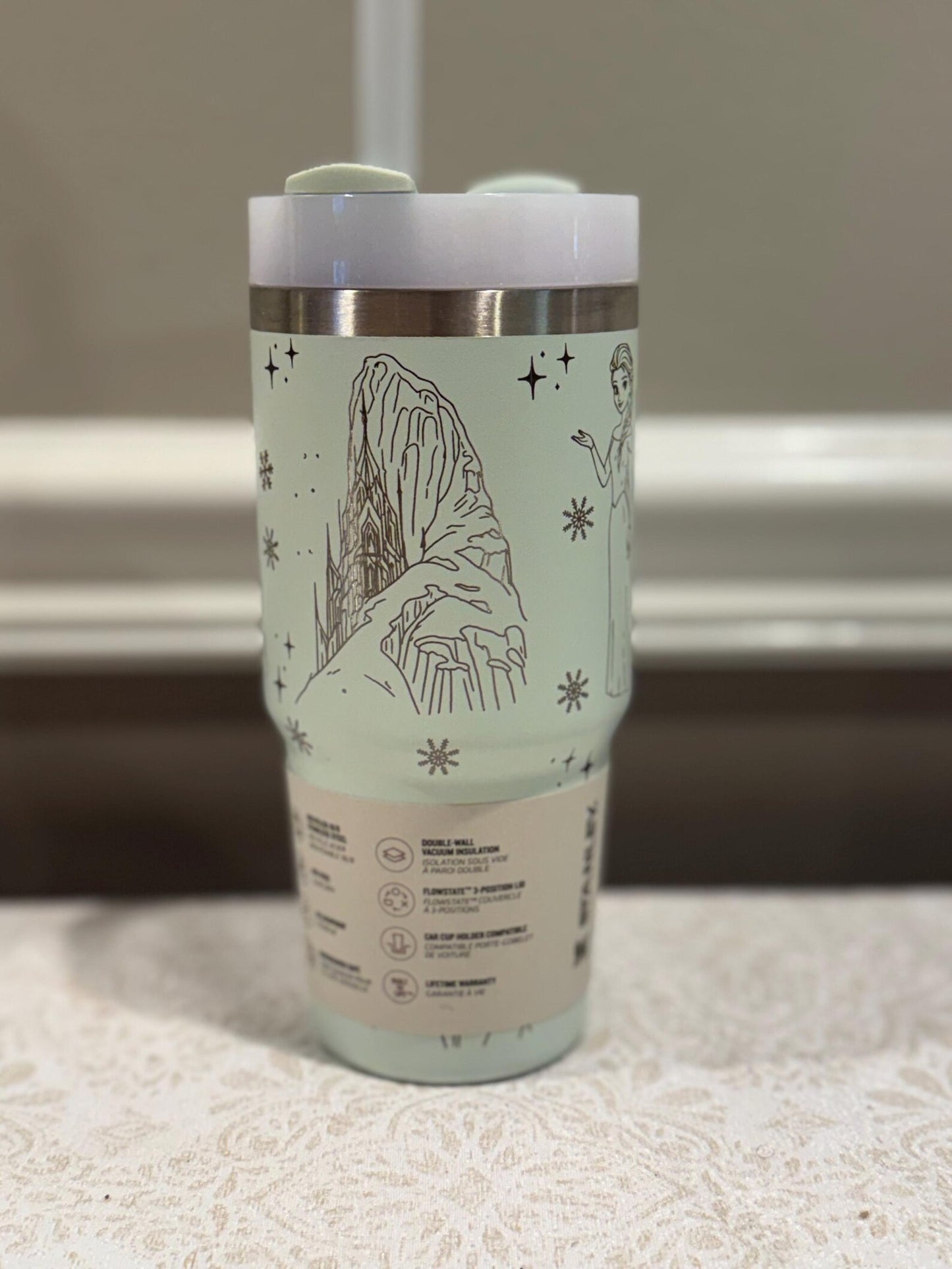 Tumbler with a design on a neutral background